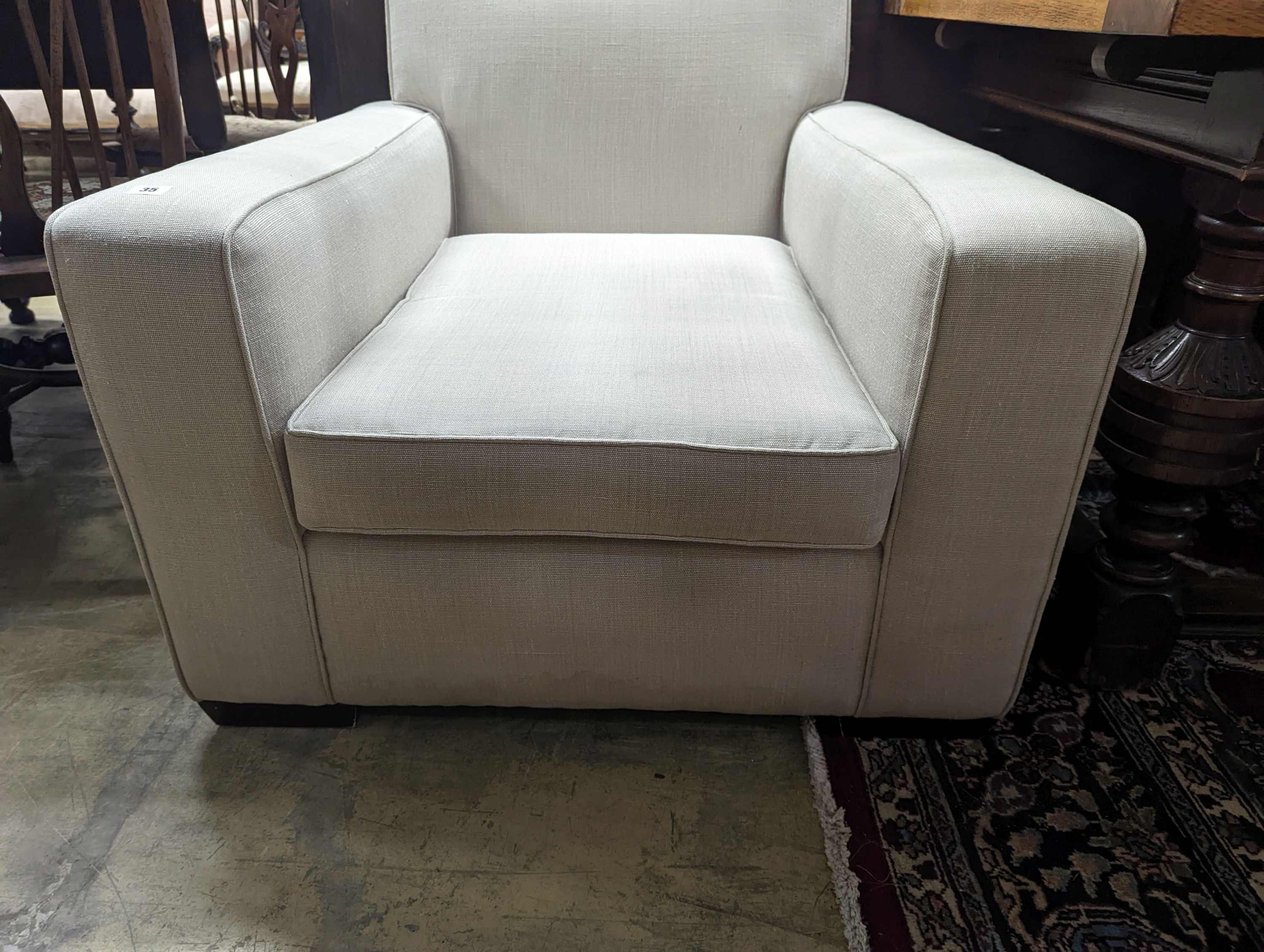 Kingcome furniture, Texas armchair in cream fabric, width 88cm, depth 98cm, height 82cm